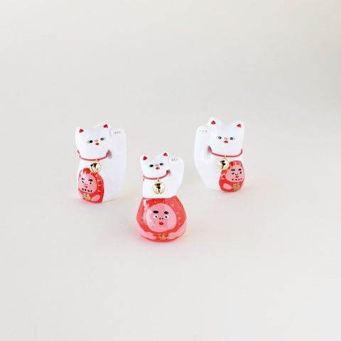Cat with Daruma